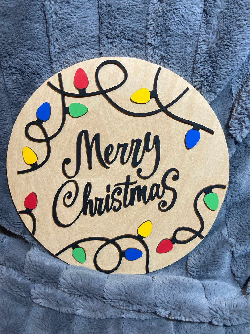 Merry Christmas with colorful light string wood round